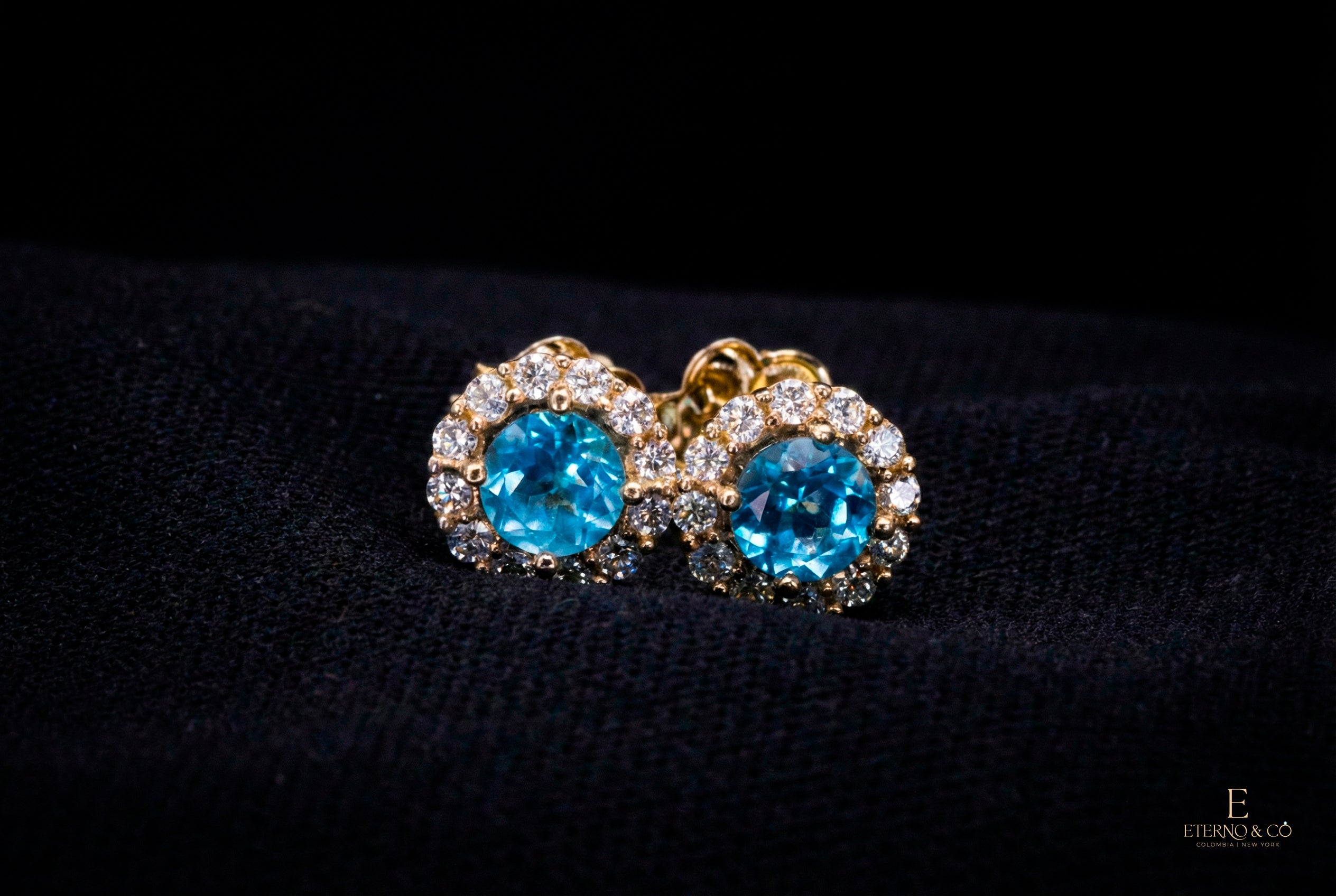 BLUE TOPAZ STUDS GLD-29