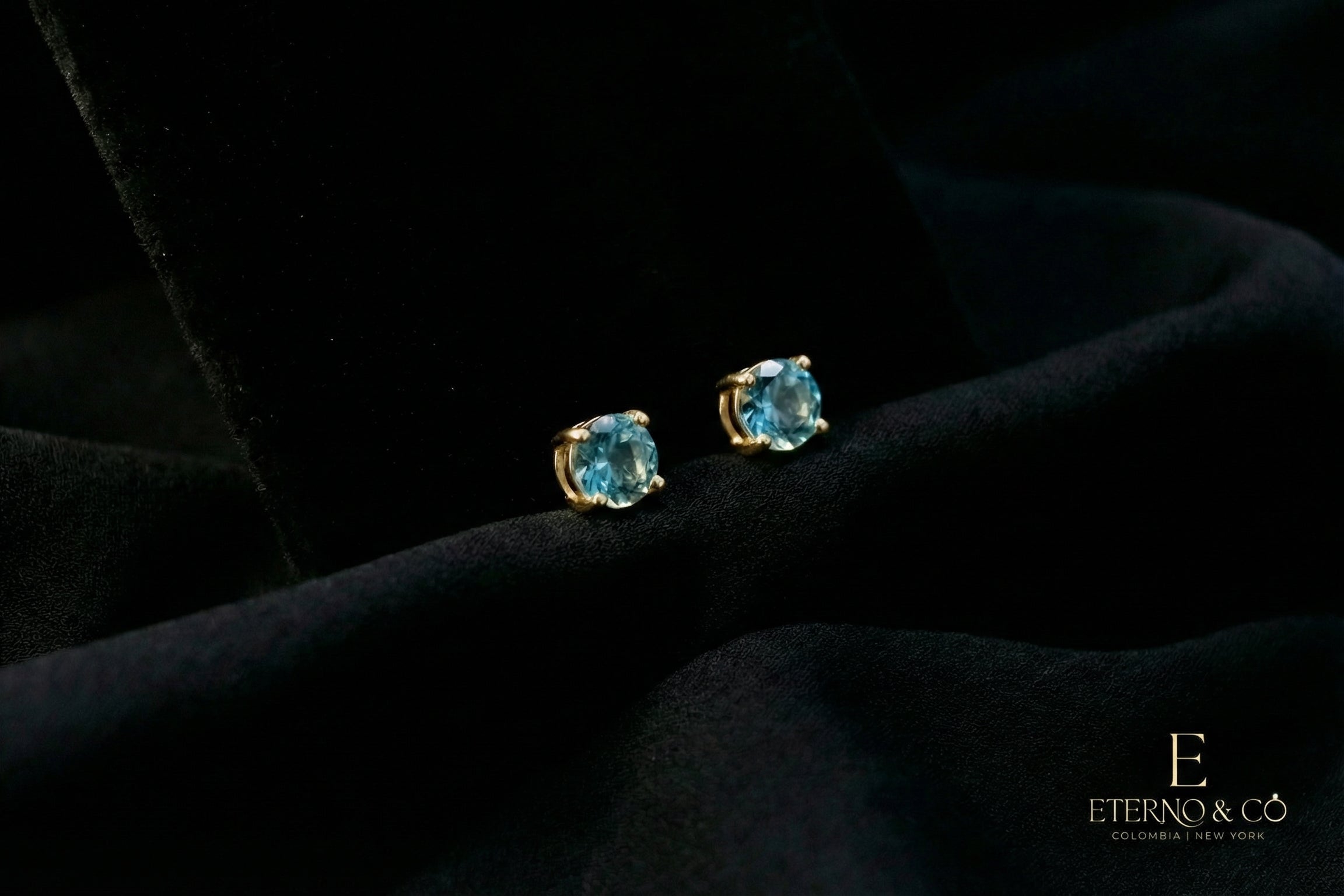 BLUE TOPAZ STUDS