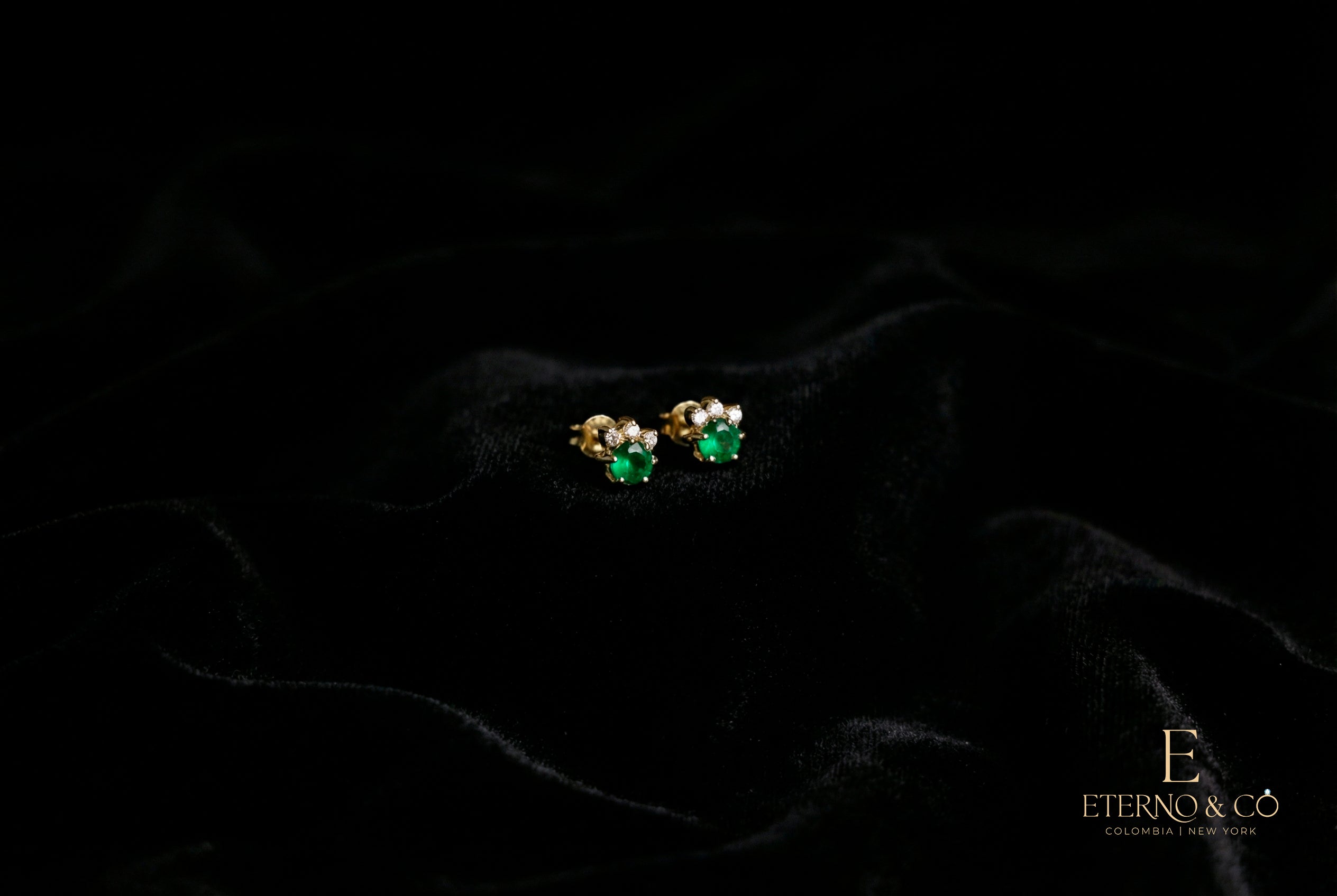 EMERALD AND DIAMOND STUDS